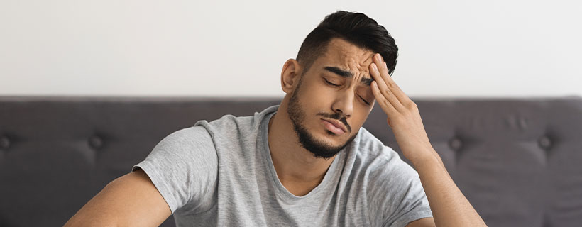 patient needing headache chiropractor in Richardson TX